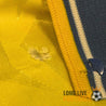 Petit défaut tissu sous le col du maillot Everton 90-91 extérieur