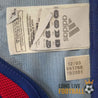Etiquette de série 641768 sur le maillot de la France 2004