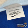 Étiquette avec référence FJ1259-452 du maillot France 2024 Mbappé
