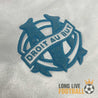 Logo sur maillot vintage de l'Olympique de Marseille 1993/1994