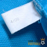 Étiquette intérieure du maillot indiquant la date de fabrication 4/00