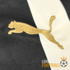 Logo Puma doré brodé sur le maillot Newcastle United 2018-2019