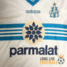 Détail du sponsor Parmalat au centre du maillot de l’OM 96/97