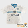 Maillot vintage de l’OM saison 1996-1997 avec col à liseré bleu et écusson brodé