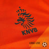Logo KNVB noir stylisé sur fond orange, brodé sur le maillot des Pays-Bas Euro 2012 version domicile