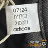Étiquette intérieure du maillot Real Madrid 2024 avec le code IY1763, indiquant une production Adidas datée de 07/24