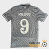 Vue complète du dos du maillot Real Madrid 2024 floqué Mbappé #9, avec col polo et motif all-over